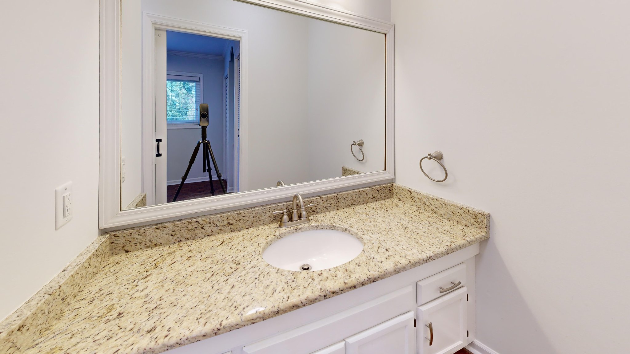 Finished bathroom with granite vanity in Raleigh townhouse